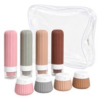 UNIQ Travelle Påfyllningsbart 90 ml reseflaske- och 40 ml behållarset i silikon